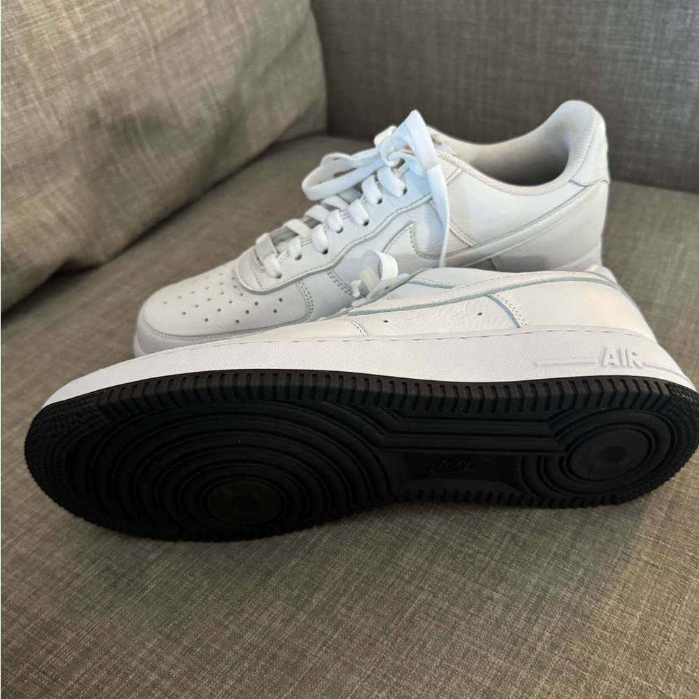 Nike White Sneakers with Black Sole